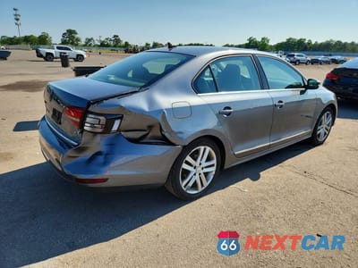 Trzecie zdjęcie samochodu z tyłu: 2017 VOLKSWAGEN JETTA SEL VIN:3VWL17AJ0HM405338 - miniatura