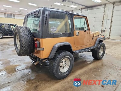 Trzecie zdjęcie samochodu z tyłu: 1987 JEEP WRANGLER SPORT VIN:2BCCV8138HB524692 - miniatura