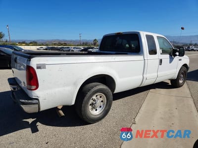 Trzecie zdjęcie samochodu z tyłu: 2003 FORD F250 SUPER DUTY VIN:1FTNX20LX3EB32973 - miniatura