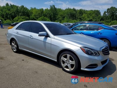 Czwarte zdjęcie samochodu z boku: 2014 MERCEDES-BENZ E 350 4MATIC VIN:WDDHF8JB3EA972487 - miniatura