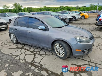 Czwarte zdjęcie samochodu z boku: 2012 VOLKSWAGEN GOLF VIN:WVWDM7AJ1CW200392 - miniatura