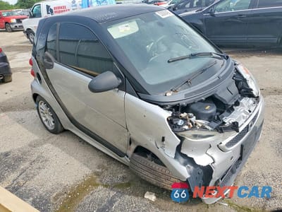 Czwarte zdjęcie samochodu z boku: 2014 SMART FORTWO VIN:WMEEJ9AA7EK736218 - miniatura