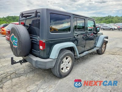 Trzecie zdjęcie samochodu z tyłu: 2011 JEEP WRANGLER UNLIMITED SPORT VIN:1J4BA3H15BL510781 - miniatura