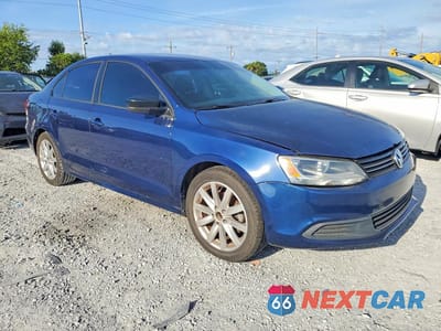 Czwarte zdjęcie samochodu z boku: 2014 VOLKSWAGEN JETTA TDI VIN:3VW3L7AJ4EM330259 - miniatura