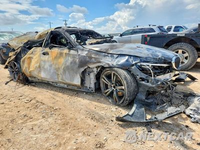 Czwarte zdjęcie samochodu z boku: 2021 BMW 330I VIN:3MW5R1J09M8B71564 - miniatura