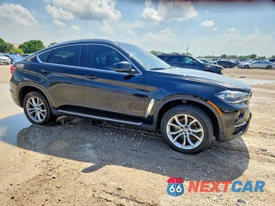 Czwarte zdjęcie samochodu z boku: 2015 BMW X6 XDRIVE35I VIN:5UXKU2C5XF0F95787 - miniatura
