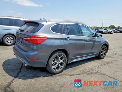 Trzecie zdjęcie samochodu z tyłu: 2018 BMW X1 XDRIVE28I VIN:WBXHT3Z39J4A66393 - miniatura