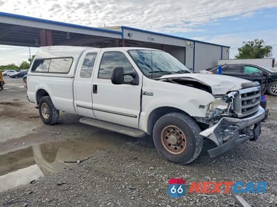 Czwarte zdjęcie samochodu z boku: 2000 FORD F250 SUPER DUTY VIN:1FTNX20L4YED09511 - miniatura