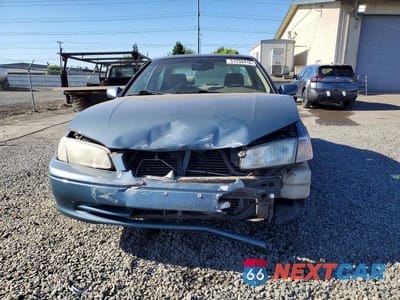 Piąte zdjęcie samochodu w środku: 2000 TOYOTA CAMRY LE V6 VIN:JT2BF22K8Y0278926 - miniatura