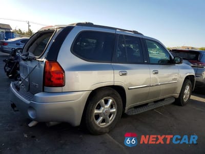 Trzecie zdjęcie samochodu z tyłu: 2006 GMC ENVOY VIN:1GKDT13S162182238 - miniatura