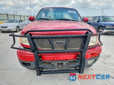Piąte zdjęcie samochodu w środku: 2000 FORD F150 VIN:1FTRX18L5YKB02966 - miniatura