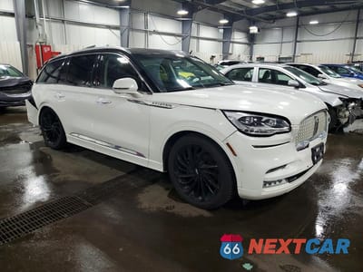 Czwarte zdjęcie samochodu z boku: 2022 LINCOLN AVIATOR RESERVE VIN:5LM5J7XC7NGL02792 - miniatura