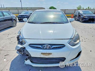 Piąte zdjęcie samochodu w środku: 2014 HYUNDAI ACCENT GLS VIN:KMHCT4AE0EU749754 - miniatura