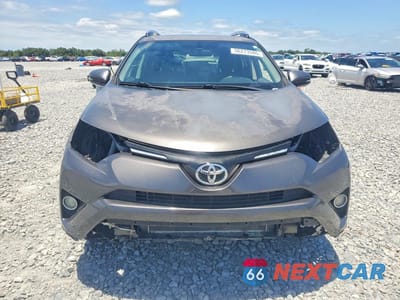 Piąte zdjęcie samochodu w środku: 2016 TOYOTA RAV4 XLE VIN:2T3WFREV7GW252383 - miniatura