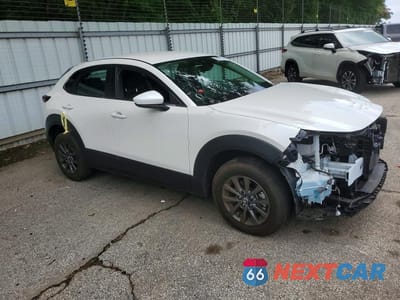 Czwarte zdjęcie samochodu z boku: 2022 MAZDA CX-30 VIN:3MVDMBAL1NM421478 - miniatura