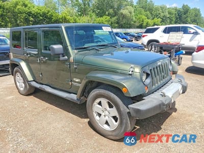 Czwarte zdjęcie samochodu z boku: 2009 JEEP WRANGLER UNLIMITED SAHARA VIN:1J4GA59159L733168 - miniatura