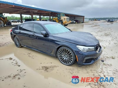 Czwarte zdjęcie samochodu z boku: 2019 BMW 740 I VIN:WBA7E2C55KB217261 - miniatura