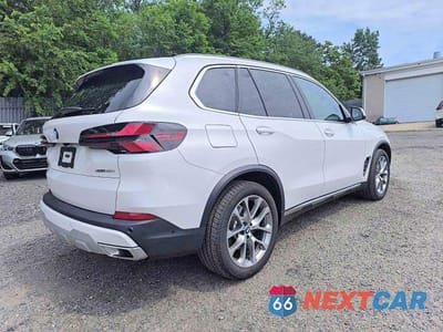 Czwarte zdjęcie samochodu z boku: 2026 BMW X5 XDRIVE40I VIN:5UX23EU09T9191603 - miniatura