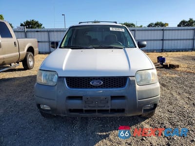 Piąte zdjęcie samochodu w środku: 2003 FORD ESCAPE XLT VIN:1FMYU93103KE07031 - miniatura