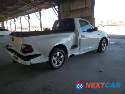 Trzecie zdjęcie samochodu z tyłu: 2001 FORD F150 SVT LIGHTNING VIN:2FTZF07381CB06079 - miniatura