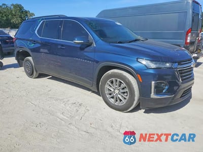 Czwarte zdjęcie samochodu z boku: 2023 CHEVROLET TRAVERSE LT VIN:1GNERGKW0PJ154578 - miniatura
