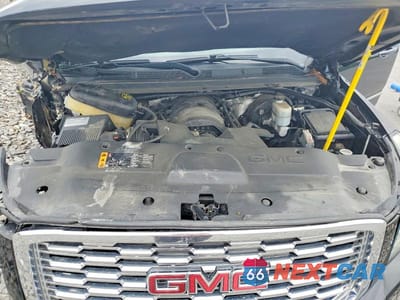 Zdjęcie 12 z 14 samochodu: 2018 GMC YUKON DENALI VIN:1GKS1CKJ3JR170285 - miniatura
