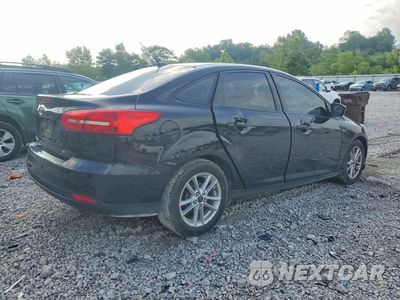 Trzecie zdjęcie samochodu z tyłu: 2018 FORD FOCUS SE VIN:1FADP3F25JL273142 - miniatura