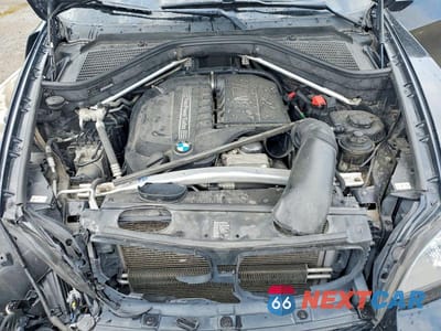 Zdjęcie 12 z 13 samochodu: 2013 BMW X5 XDRIVE35I VIN:5UXZV4C51D0B06925 - miniatura