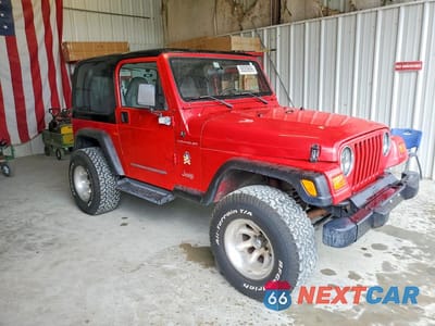 Czwarte zdjęcie samochodu z boku: 2000 JEEP WRANGLER / TJ SE VIN:1J4FA29P6YP735131 - miniatura
