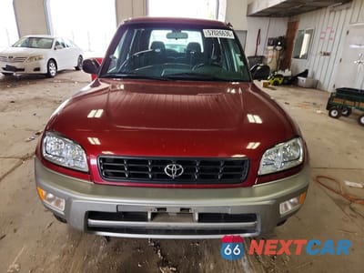 Piąte zdjęcie samochodu w środku: 2000 TOYOTA RAV4 BASE VIN:JT3GP10V2Y0046778 - miniatura