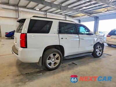 Trzecie zdjęcie samochodu z tyłu: 2020 CHEVROLET TAHOE K1500 LT VIN:1GNSKBKC7LR108841 - miniatura
