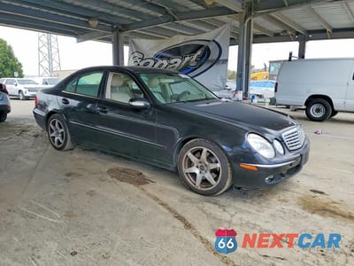Czwarte zdjęcie samochodu z boku: 2005 MERCEDES-BENZ E 500 VIN:WDBUF70J45A713338 - miniatura