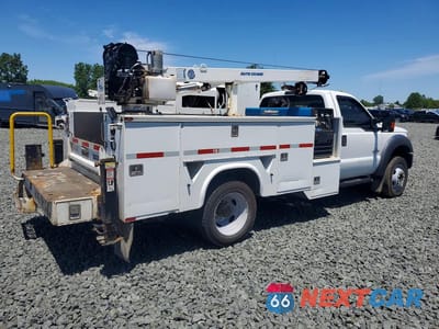 Trzecie zdjęcie samochodu z tyłu: 2016 FORD F550 SUPER DUTY VIN:1FDUF5GT3GED28129 - miniatura
