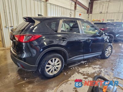 Trzecie zdjęcie samochodu z tyłu: 2015 MAZDA CX-5 TOURING VIN:JM3KE4CY9F0477691 - miniatura