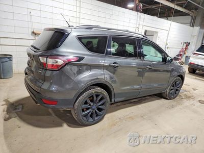 Trzecie zdjęcie samochodu z tyłu: 2018 FORD ESCAPE SE VIN:1FMCU9GD6JUD59406 - miniatura