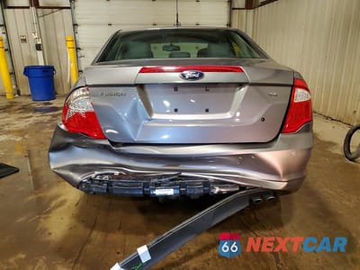Zdjęcie 6 z 12 samochodu: 2011 FORD FUSION SE VIN:3FAHP0HA6BR307824 - miniatura