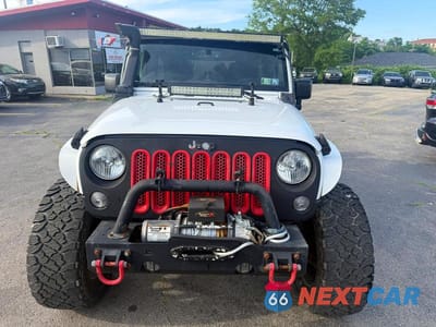 Piąte zdjęcie samochodu w środku: 2014 JEEP WRANGLER UNLIMITED SPORT VIN:1C4BJWDG7EL203909 - miniatura