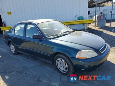 Czwarte zdjęcie samochodu z boku: 1997 HONDA CIVIC LX VIN:2HGEJ6674VH569724 - miniatura