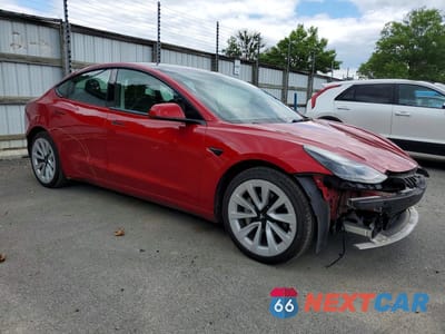 Czwarte zdjęcie samochodu z boku: 2022 TESLA MODEL 3 VIN:5YJ3E1EA8NF287912 - miniatura