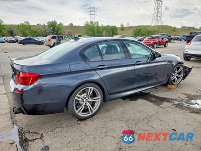Trzecie zdjęcie samochodu z tyłu: 2013 BMW M5 VIN:WBSFV9C50DC773801 - miniatura