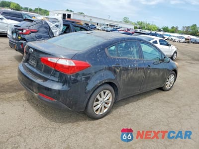Trzecie zdjęcie samochodu z tyłu: 2014 KIA FORTE LX VIN:KNAFX4A65E5077759 - miniatura