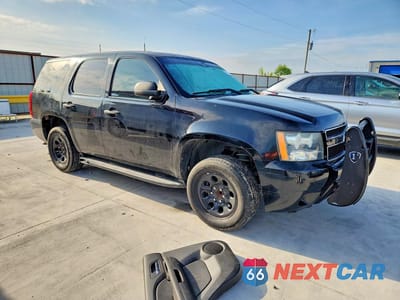 Czwarte zdjęcie samochodu z boku: 2012 CHEVROLET TAHOE POLICE VIN:1GNLC2E02CR170067 - miniatura