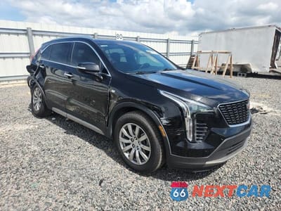 Czwarte zdjęcie samochodu z boku: 2021 CADILLAC XT4 PREMIUM LUXURY VIN:1GYFZDR4XMF077257 - miniatura