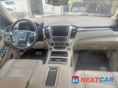 Zdjęcie 9 z 12 samochodu: 2016 GMC YUKON XL DENALI VIN:1GKS2HKJ9GR433544 - miniatura