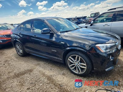 Czwarte zdjęcie samochodu z boku: 2015 BMW X4 XDRIVE28I VIN:5UXXW3C54F0M87359 - miniatura