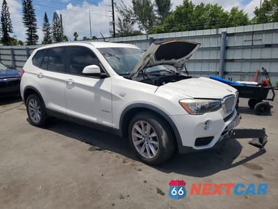 Czwarte zdjęcie samochodu z boku: 2017 BMW X3 SDRIVE28I VIN:5UXWZ7C50H0V85883 - miniatura