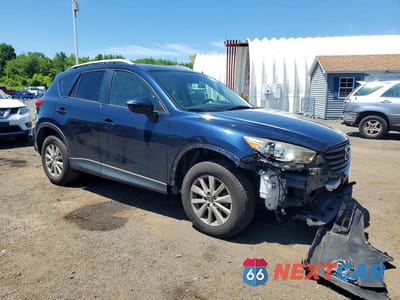 Czwarte zdjęcie samochodu z boku: 2016 MAZDA CX-5 TOURING VIN:JM3KE4CY8G0806706 - miniatura