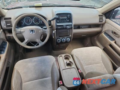 Zdjęcie 8 z 12 samochodu: 2004 HONDA CR-V LX VIN:JHLRD68564C016774 - miniatura
