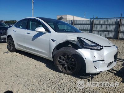 Czwarte zdjęcie samochodu z boku: 2020 TESLA MODEL 3 VIN:5YJ3E1EAXLF599095 - miniatura