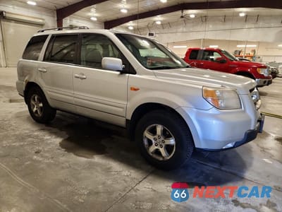 Czwarte zdjęcie samochodu z boku: 2007 HONDA PILOT EXL VIN:2HKYF18627H507401 - miniatura